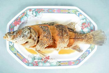 Deep fried sea bass with seasoning fish sauce